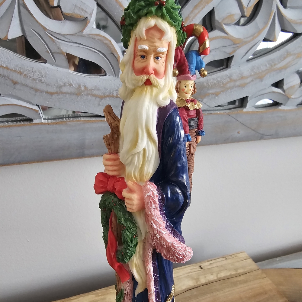 Festive Santa Claus Figurine with Wreath and Staff